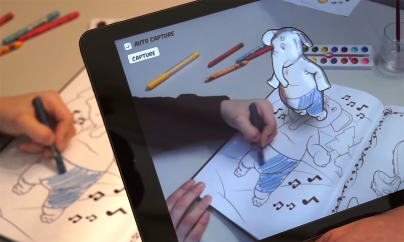 Live Texturing of Augmented Reality Characters from Colored Drawings