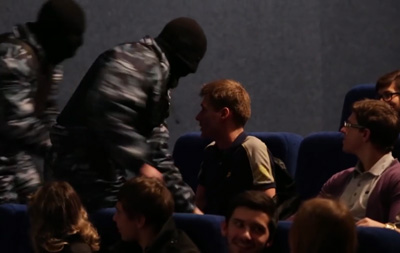 Kidnapping performance for human rights in movie theater